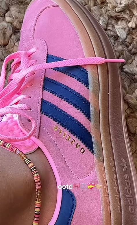 trendy adidas pink shoes.